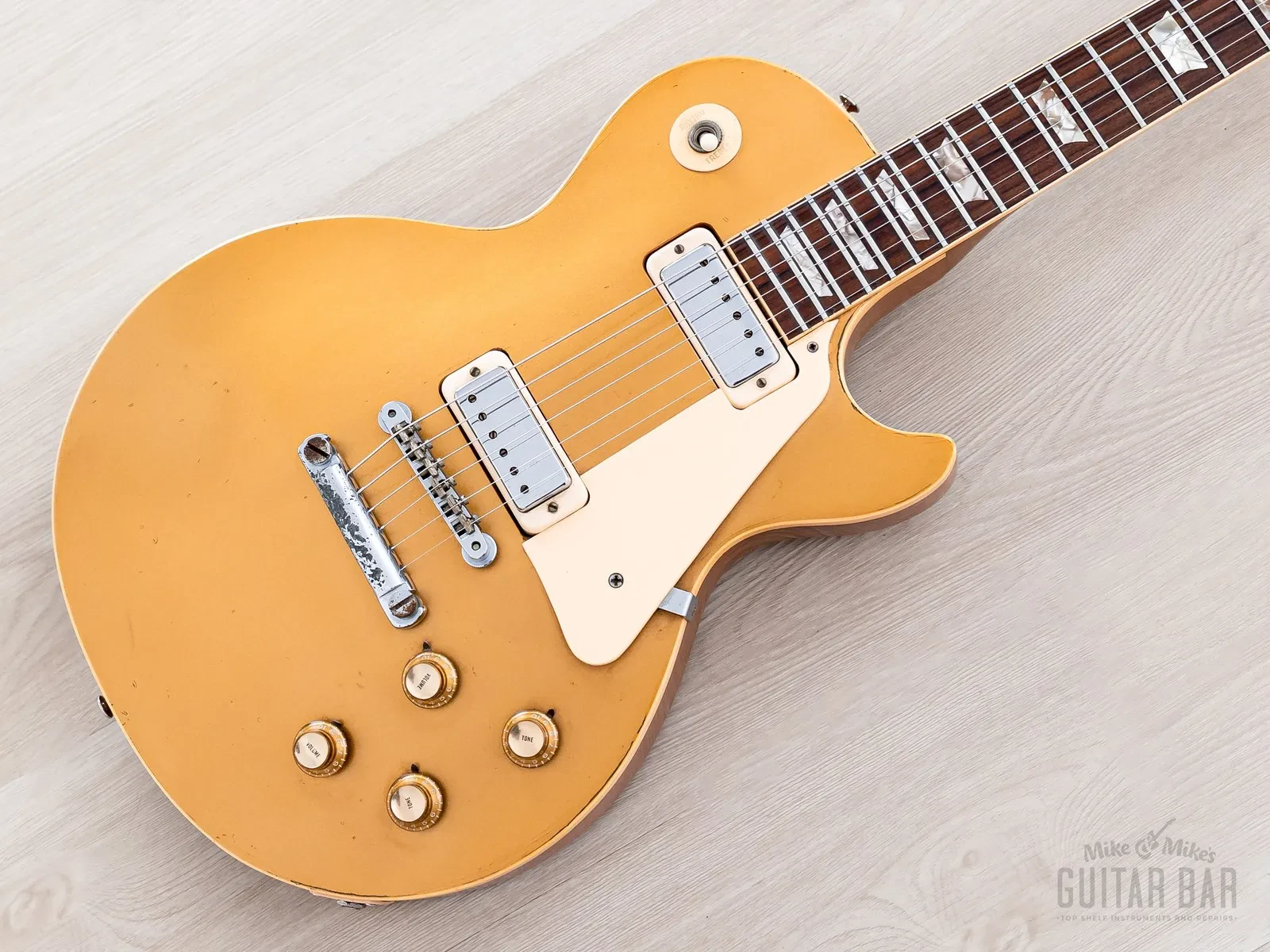 Б/У Электрогитара Gibson Les Paul Deluxe 1973 Goldtop с кейсом