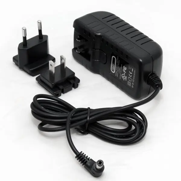 Блок питания для гитарных педалей АМТ Electronics YJS12N 12В 1.25А