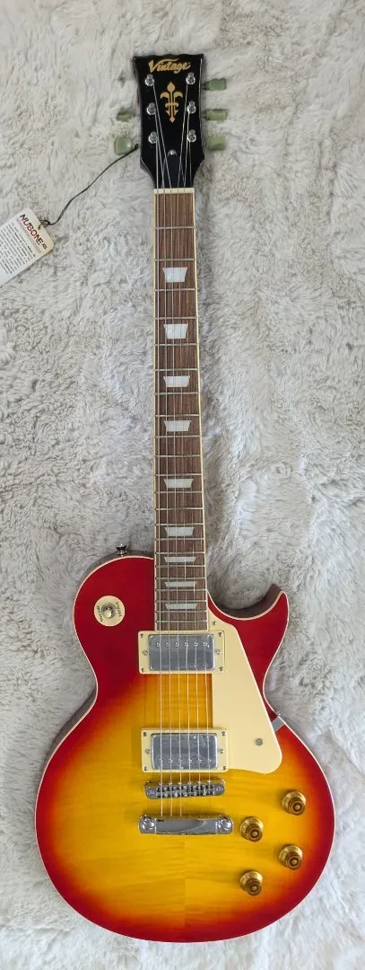 Vintage V100CS Reissued Single Cutaway Electric Guitar Cherry Sunburst - B-Stock