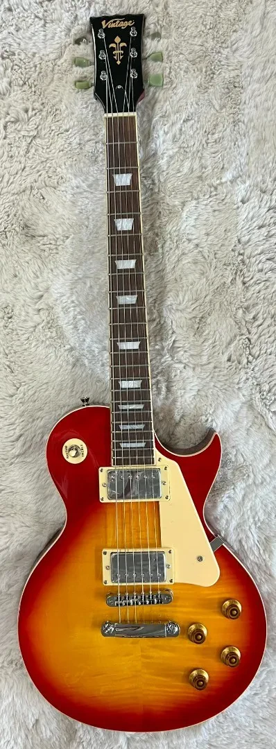 Vintage V100CS Reissued Single Cutaway Electric Guitar Cherry Sunburst - B-Stock