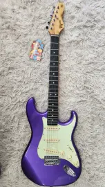 Tagima TG 500-MPP-DF/MG Electric Guitar in Metallic Purple w/creme guard - B stk