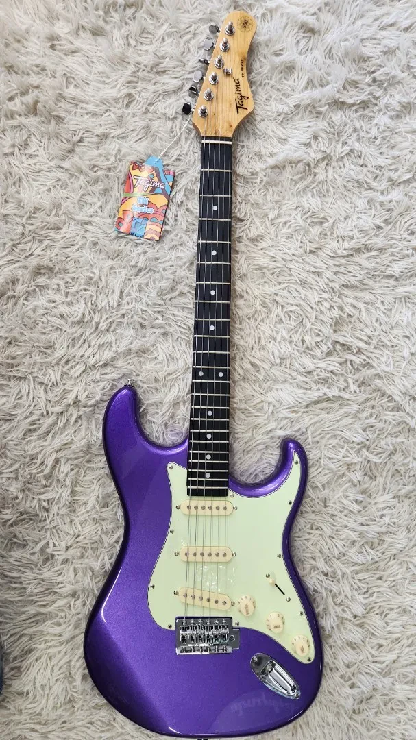 Tagima TG 500-MPP-DF/MG Electric Guitar in Metallic Purple w/creme guard - B stk