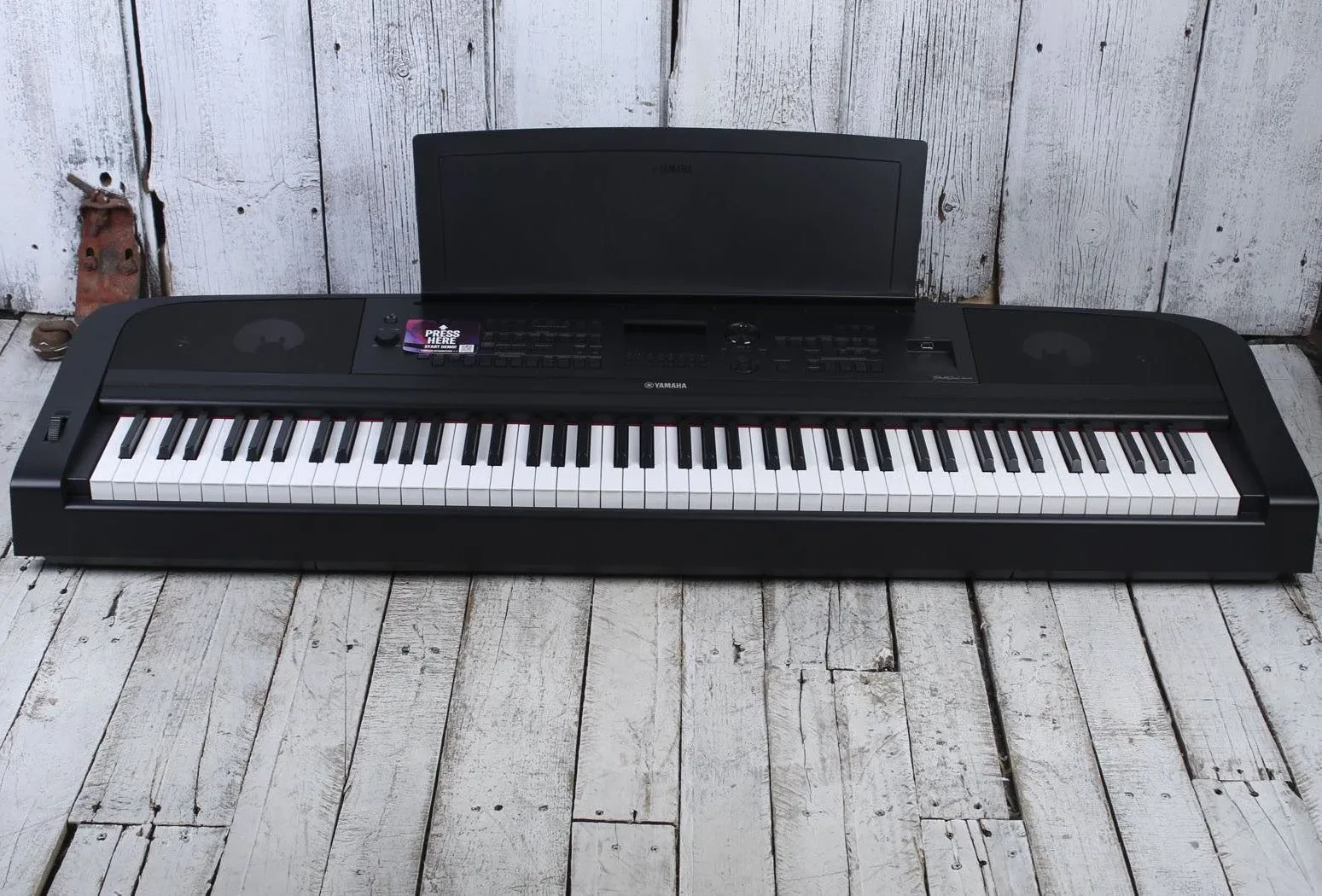Yamaha DGX-670 Black 88 Key Digital Portable Grand Piano with Sustain Pedal