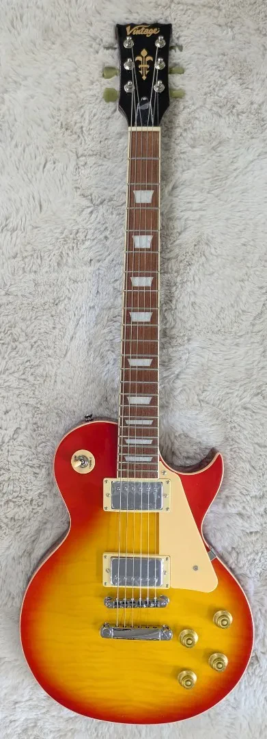 Vintage V100CS Reissued Single Cutaway Electric Guitar Cherry Sunburst - B-Stock