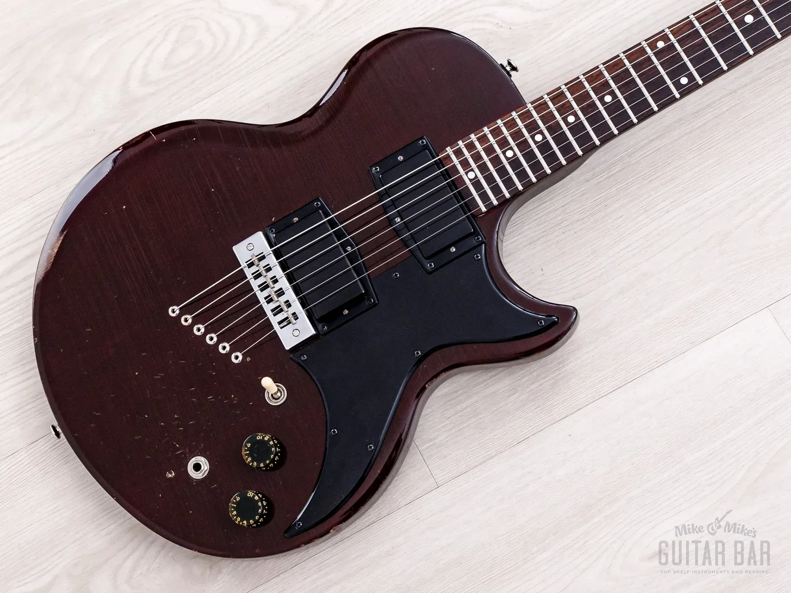 Б/У Электрогитара Gibson L6-S Deluxe 1976 винно-красный с кейсом