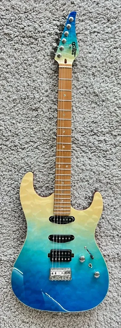 Б/У Электрогитара Jet Guitars JS-1000-QTB Double Cut, S-S-H, прозрачный синий