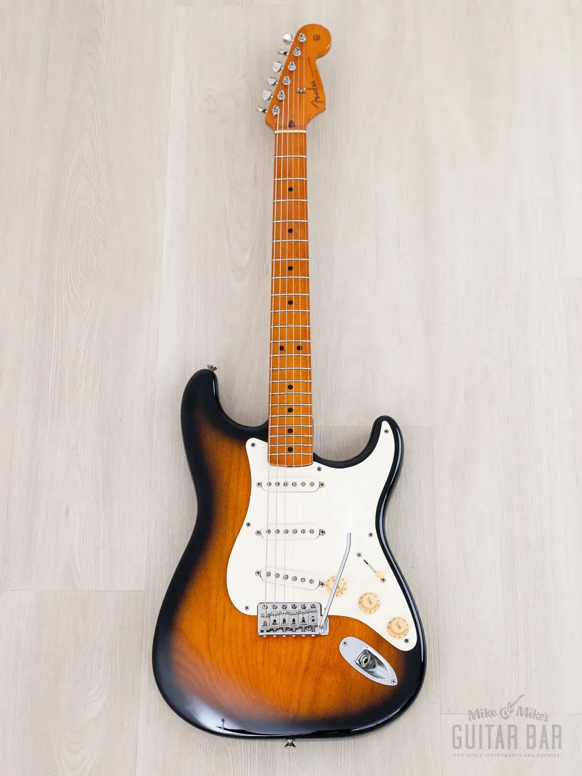 Электрогитара Fender American Vintage 1957 Stratocaster SSS Sunburst w/case USA 1997